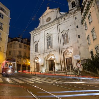 Lisbon city centre night tram long exposure church